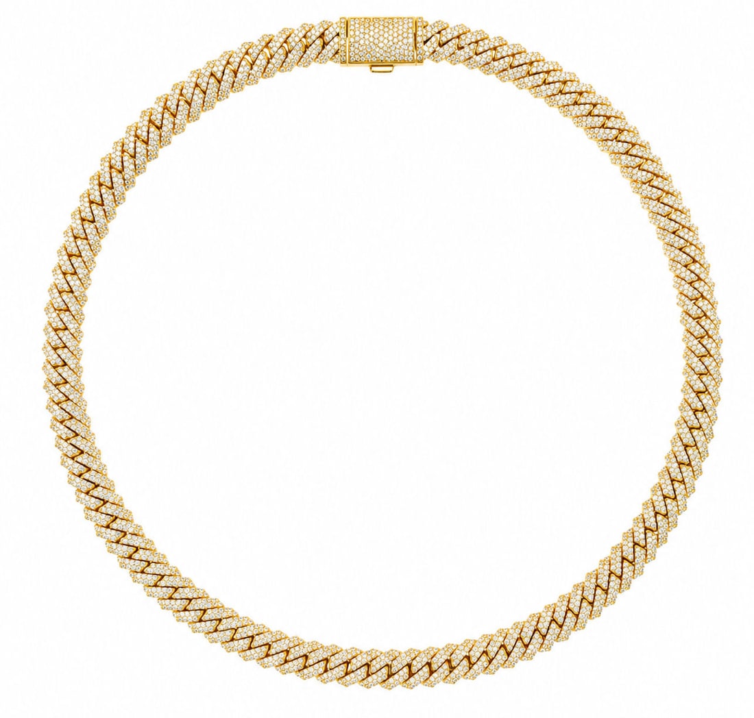 10KT Gold Prong-Set Diamond Cuban Link Chain, Approx. 23.00 CTW: Impressive diamond Cuban link chain crafted in solid 10KT yellow gold and fully iced with approximately 23.00 carats total weight of natural round brilliant-cut diamonds. This bold prong-set design de