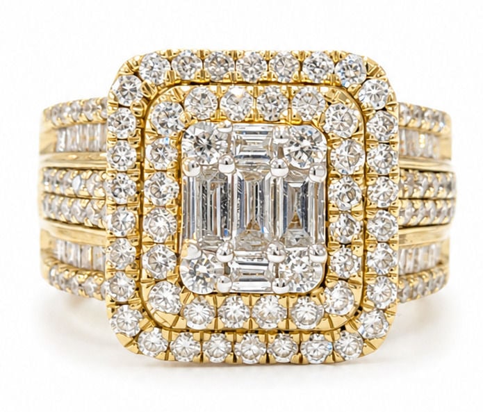14K Yellow Gold 1.60 CTW Natural Diamonds Double Halo Statement Ring: Metal: 14K Yellow Gold Stones: Natural Diamonds Total Diamond Weight: Approx. 1.60 CTW Diamond Cuts: Round Brilliant & Baguette Total Weight 8.7 grams Size 7