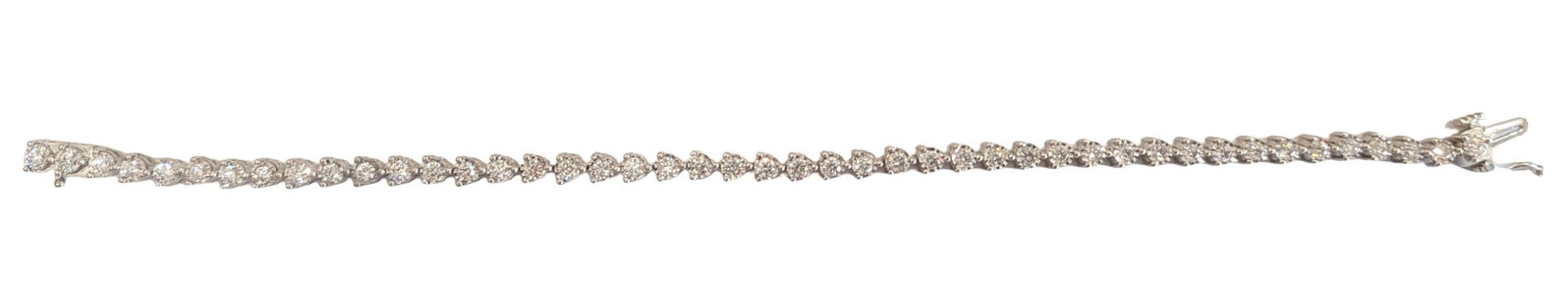 10K White Gold Diamond Heart Tennis Bracelet 1.76 CTW Natural Diamonds: Metal: 10K White Gold Weight: 9.0 grams Length: 7 1/4 inches Total Diamonds: 44 Natural Diamonds Approximate Diamond Weight: 1.76 CTW Average Stone Weight: 0.04 ct each Diamond Shape: Round Brilliant 