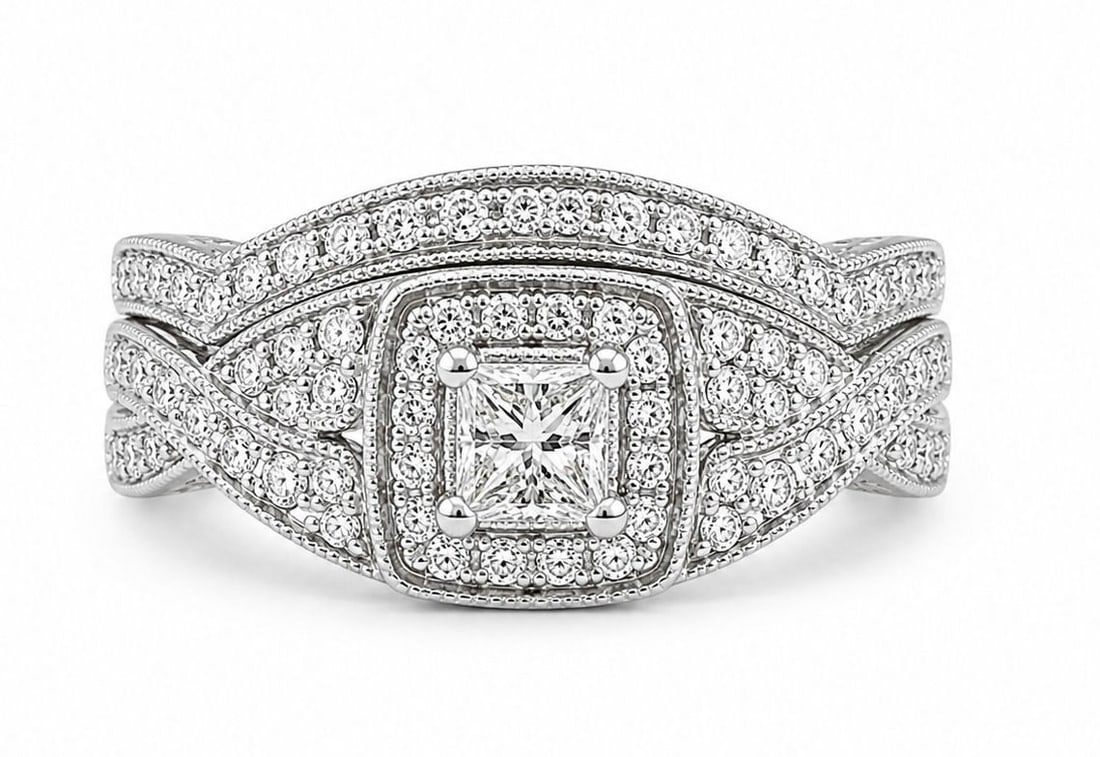 14K White Gold Diamond Bridal Set ? Princess-Cut Halo Engagement Ring & Matching Band: Metal :14kt White gold Size 7 1/4 Weight 5.6g Total Diamond Weight: 1.25 CTW aprox (0.25ct central - 1ct ring) Center Stone: Princess-Cut Diamond Accent Stones: Round Brilliant Diamonds & Baguet