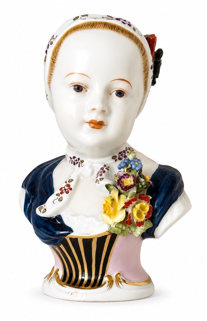 Dresden Porcelain Bust with Applied Floral Decoration: Finely detailed porcelain bust of a young woman in traditional dress, executed in the Dresden style. The figure features a smooth, pale complexion with delicately painted facial features, a patterned 