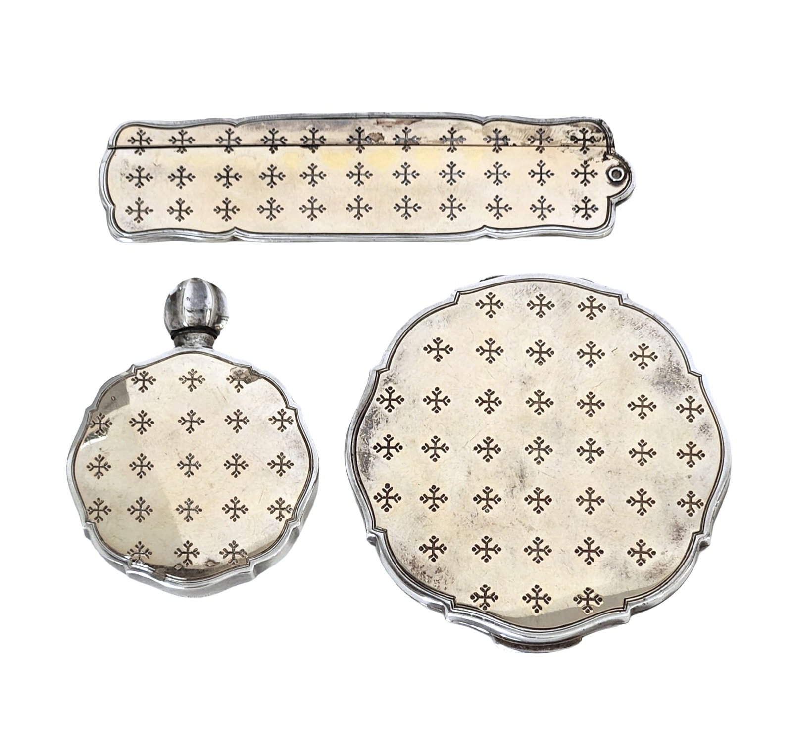 Art Deco Sterling Silver & Guilloch Enamel Vanity Set 3-Piece Compact, Perfume & Lipstick Case: Charming 3-piece Art Deco sterling silver vanity set featuring intricate guilloch enamel in a delicate cream tone with repeating black enamel starburst motifs. The set includes a round powder compact,