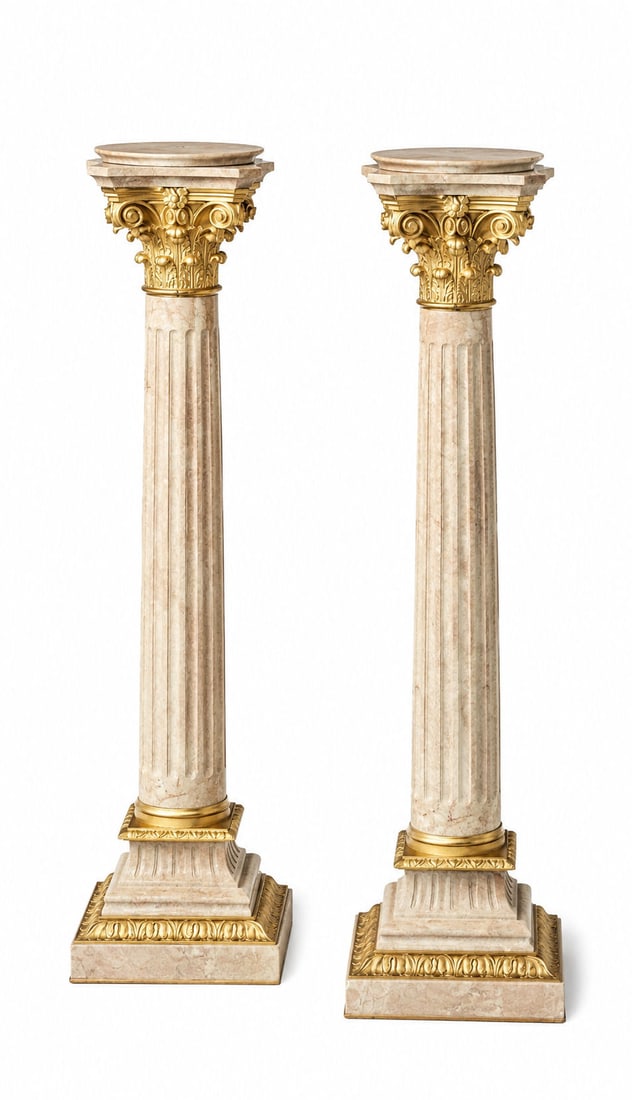 Pair of French Gilt-Bronze and Marble Pedestals: Pair of French Gilt-Bronze and Marble Pedestals Pedestals fourth quarter 19th century, set with Corinthian capitals over fluted standards, the stepped bases with gilt-bronze trim and ogee gilt-bronze 