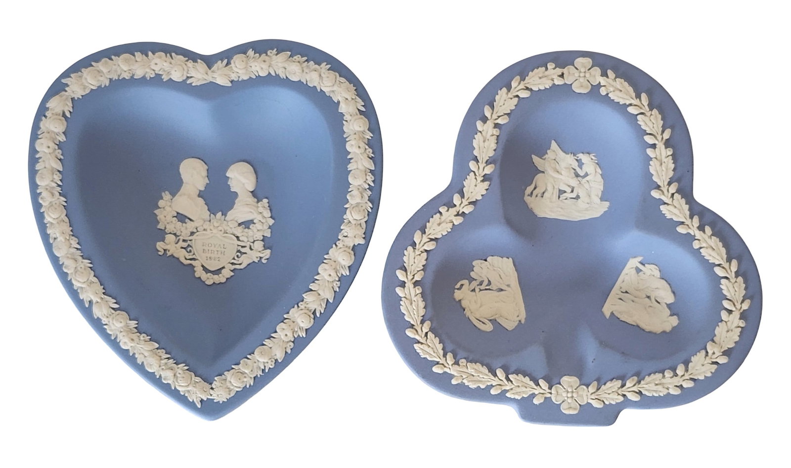 Pair of Wedgwood Jasperware Blue & White Dishes, Including 1982 Royal Birth: Pair of collectible Wedgwood Jasperware dishes in classic blue with white bas-relief decoration. Includes a heart-shaped dish commemorating the Royal Birth of 1982, featuring portrait busts and floral