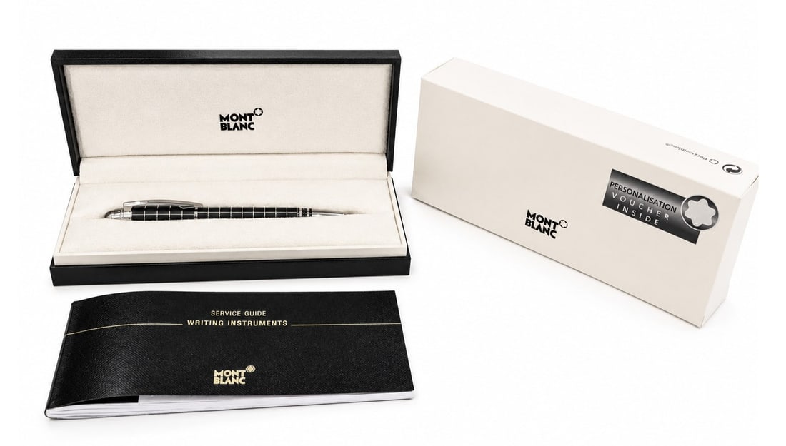 Montblanc StarWalker Black Mystery Ballpoint Pen: Montblanc StarWalker Black Mystery ballpoint pen featuring a black precious resin barrel with a geometric grid pattern and polished platinum-plated trim. The cap is topped with the iconic floating Mon