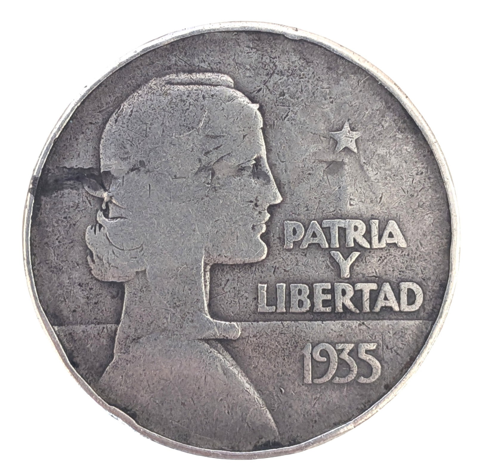 1935 Republic of Cuba Silver One Peso Coin ? " Patria y Libertad " ? 900 Fine Silver: Republic of Cuba One Peso silver coin dated 1935, struck in .900 fine silver with a standard weight of 26.7295 grams, as indicated on the reverse. The obverse features the iconic left-facing allegoric