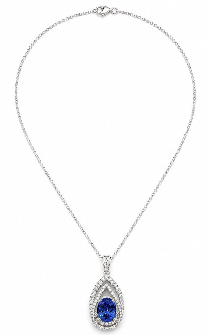 Oscar Friedman Platinum 6.06 CT GIA Tanzanite & 1.61 CT Diamond Pendant Necklace: Designer: Oscar Friedman Metal: Platinum ( PT900 Pendant ) with Platinum (P950) Chain Necklace Length: 18 Inches Total Necklace Gross Weight: 16.7 Grams Center Stone: One Oval Natural Tanzanite ( Zois