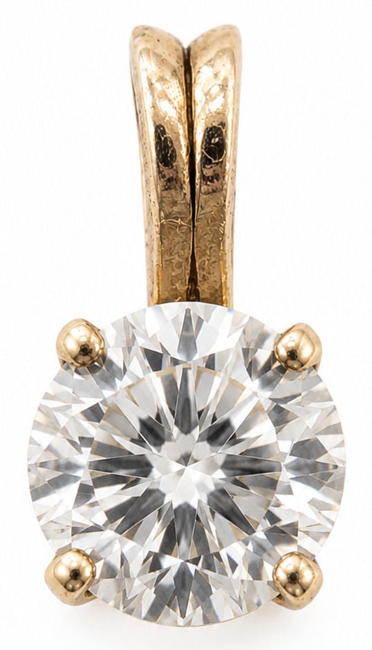 14K Yellow Gold Round Brilliant Diamond Solitaire Pendant: Crafted in 14K yellow gold, this elegant solitaire pendant features one round brilliant cut diamond securely set in a classic four prong mounting. The timeless design is complemented by a polished fix