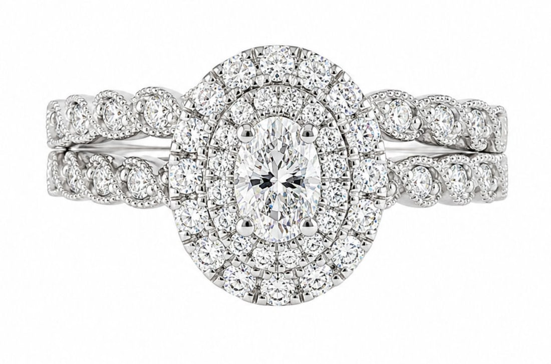 14K White Gold Diamond Halo Bridal Set Oval Center Engagement Ring & Matching Band: Metal: 14K White Gold Size 8 3/4 Weight 6.3g 1.25 ct aprox (0.25 central - 1 ring) Center Stone Shape: Oval Cut Accent Stones: Round Brilliant Diamonds Setting Style: Double Halo Bridal Set