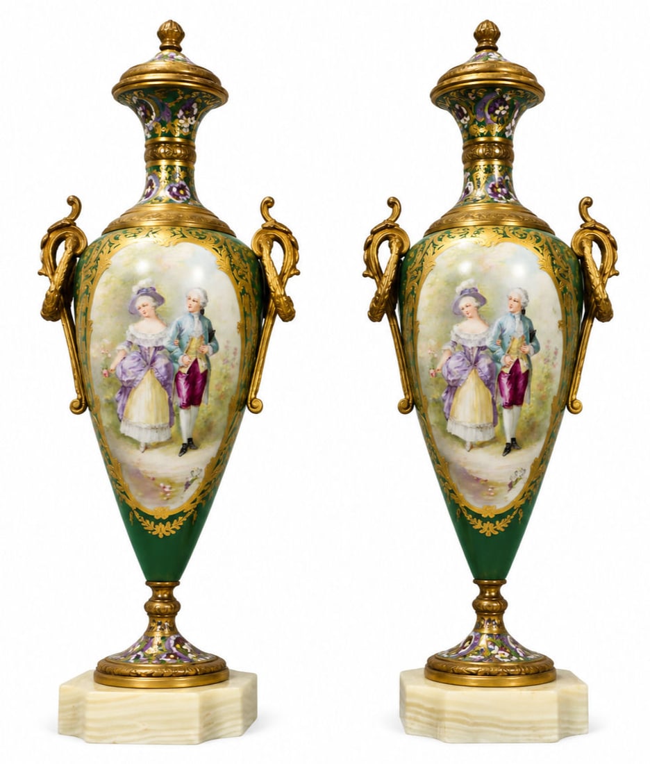 Pair of French Sevres Hand Painted & Champleve Enamel Porcelain Urns Signed " C Rochette": An extraordinary pair of late 19th century French Sevres emerald green porcelain covered urns, artist signed " C Rochette" and mounted with champleve enamel, gilt bronze, and onyx. Each vase features 