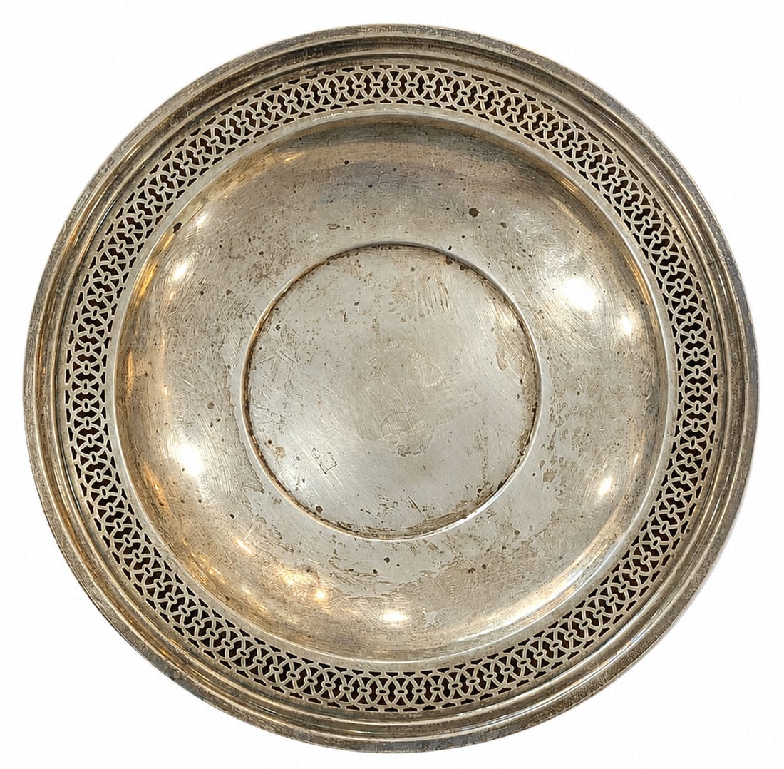 Sterling Silver Round Pierced Reticulated Plate / Dish (Model 823): A fine round sterling silver dish featuring a reticulated border with openwork geometric lattice piercing leading into a curved cavetto and a plain circular central well. The underside is stamped "STE