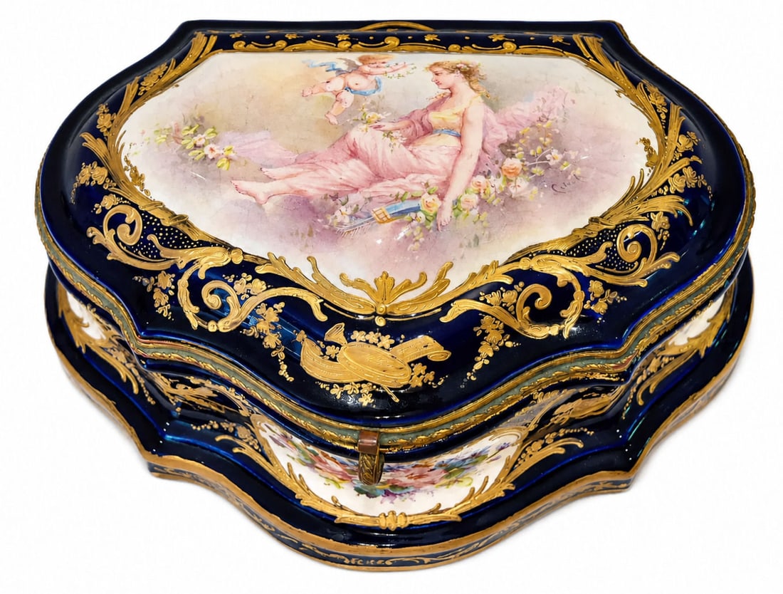 Large French Sevres Style Hand Painted Porcelain Jewelry Box: An impressive 19th century French Sevres style cobalt blue (bleu de roi) porcelain hinged trinket or jewelry box. The hinged cover is centered with a fine hand painted oval medallion depicting a maide