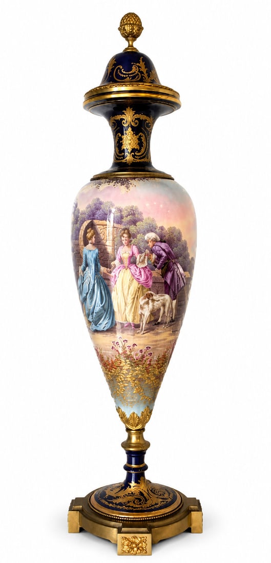 Antique 19th Century French Sevres Porcelain Lidded Vase with Gilt Bronze Mounts: Exceptional antique French Sevres porcelain vase dating to the 19th century, richly decorated with hand-painted figural scenes and elaborate gilded ornamentation. The ovoid body features a detailed co