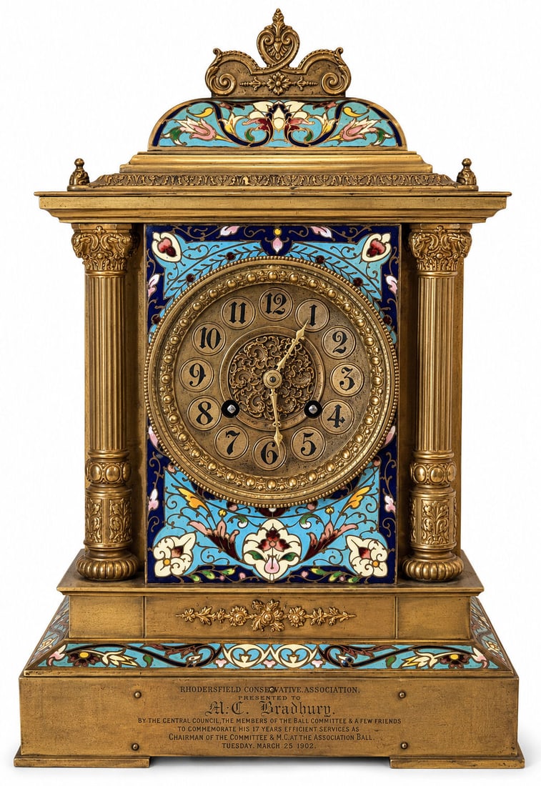 Antique French Gilt Bronze & Champlev Enamel Mantel Clock, Inscribed Presentation, c. 1902: Antique French mantel clock housed in an ornate gilt bronze case with fluted columns, foliate mounts, and richly decorated champlev enamel panels in blue, turquoise, white, and red with scrolling flor