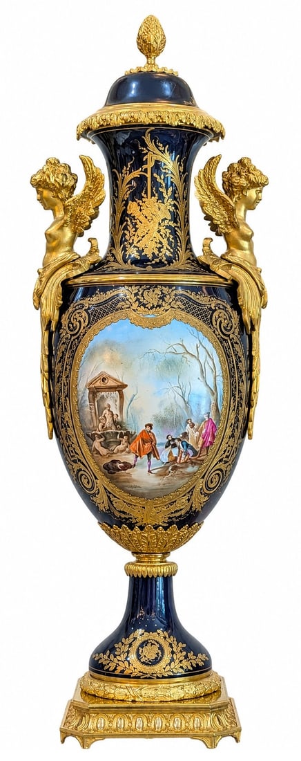 Fine French Cobalt Blue Porcelain and Ormolu Covered Urn with Winged Maiden Handles: Exceptional French cobalt blue porcelain covered urn mounted in finely chased gilt bronze ( ormolu ). The urn features a richly decorated deep cobalt ground with elaborate hand - painted gilt scrollwo