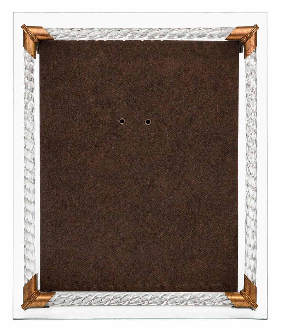 Italian Murano Twisted Glass and Brass Table Picture Frame: This elegant mid century tabletop picture frame features a clear bevel-edge glass panel bordered by four twisted clear glass rod accents secured with patinated brass corner brackets. Designed in a dis