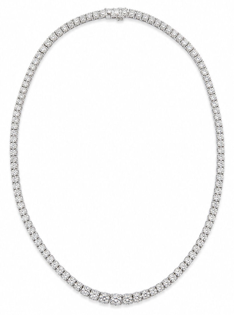 Oscar Friedman 14K White Gold 29.00 Carat Diamond Tennis Necklace: Designer: Oscar Friedman Length: 17.5 Inches Metal: 14K White Gold Total Necklace Gross Weight: 29.2 Grams Main Stones: One Hundred Seven Round Brilliant Cut Natural Diamonds Total Diamond Weight: 29.