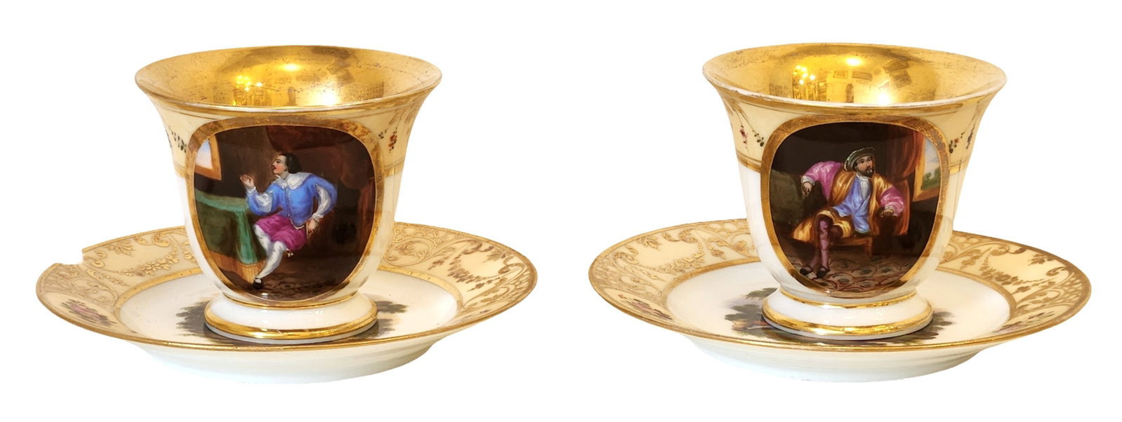 Antique Gilt Porcelain Cup and Saucer with Figural Reserves, 19th Century: Antique porcelain cup and saucer, each decorated with richly gilt borders and hand-painted figural reserve panels depicting male figures in period costume within interior settings. The interiors of th