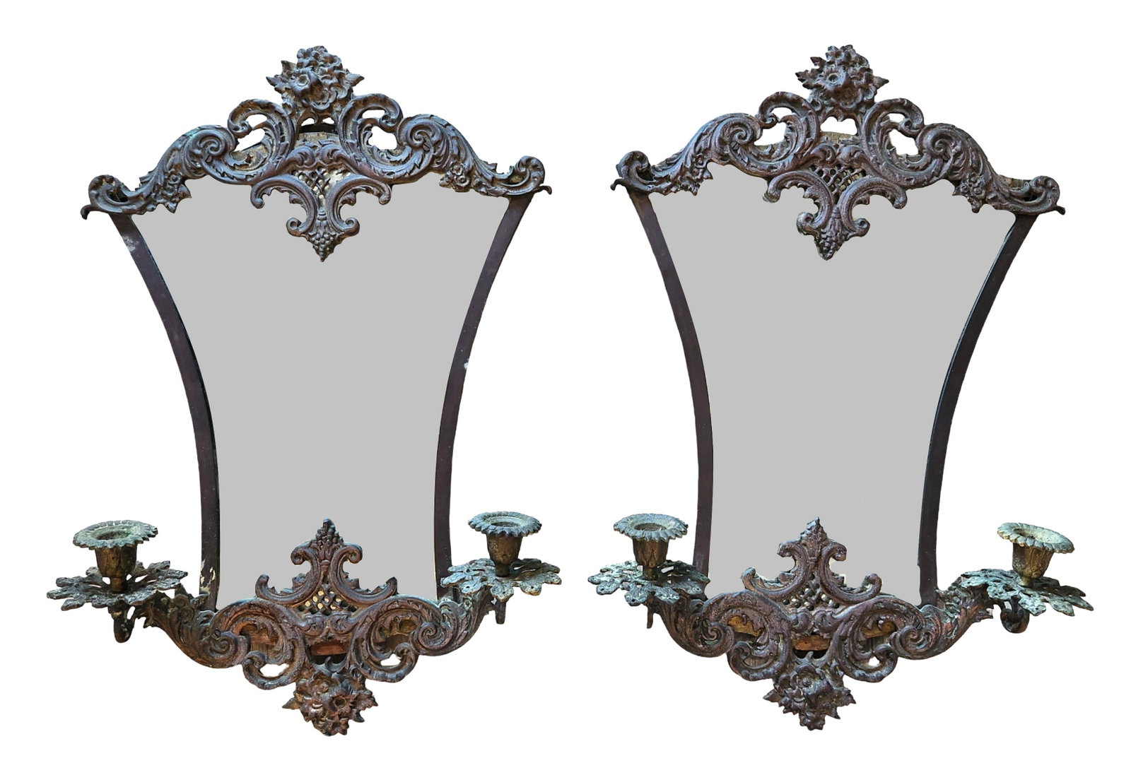 Antique Rococo Style Wall Mirrors with Candle Sconces Pair, Cast Metal Frames: Impressive antique Rococo-style wall mirrors, offered as a matching pair, each richly ornamented with scrolling foliate motifs, floral crests, and pierced decorative elements. The frames appear to be 