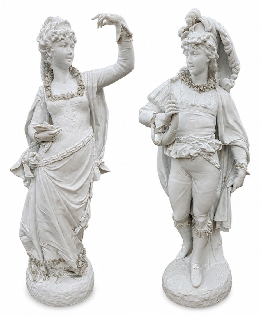 Pair of Large Capodimonte White Glazed Porcelain Figures: An impressive pair of Capodimonte white glazed porcelain figures depicting an elegant lady and a gentleman dressed in 18th-century attire. Finely modeled with expressive facial features, elaborate per