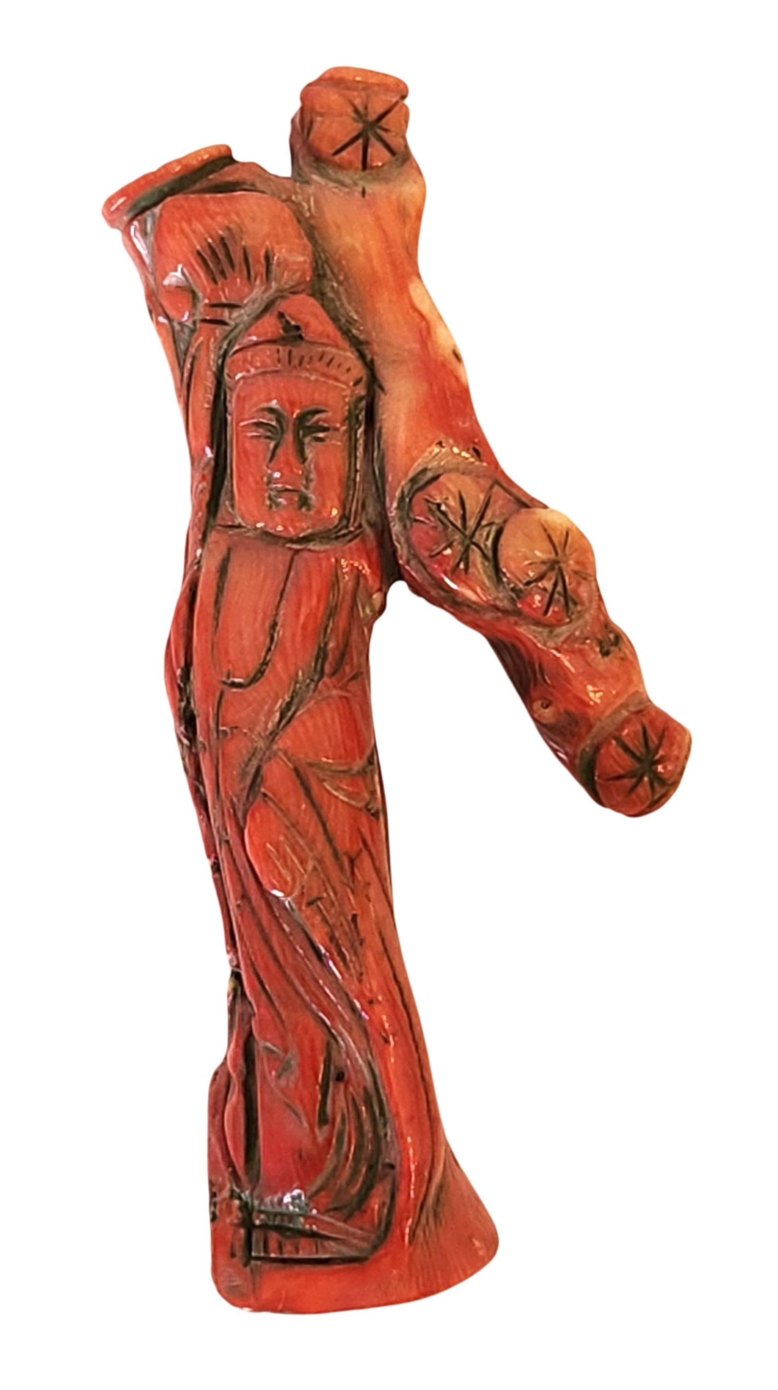 Antique Carved Red Coral Figure of Guanyin, Mid-20th Century: A carved Mediterranean red coral figure depicting Guanyin, the Bodhisattva of Compassion, shown standing in flowing robes. The carving is worked from a natural coral branch, displaying warm red tones