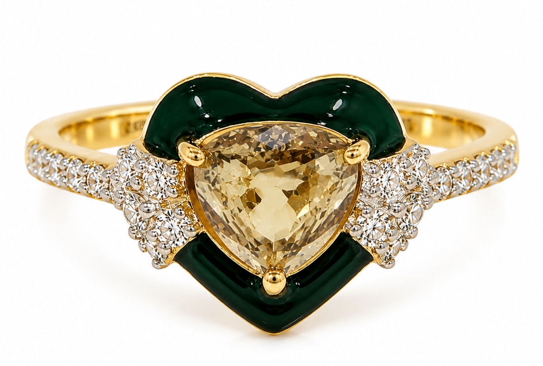 Sheffield & Sons GIA Certified 14K Gold Color Change Alexandrite and Diamond Heart Ring: Metal: 14K Yellow Gold Size: 6 3/4 Total Ring Weight: 2.9 Grams Maker: Sheffield & Sons Design: Elegant heart-shaped design featuring a GIA certified natural color change alexandrite accented by gloss
