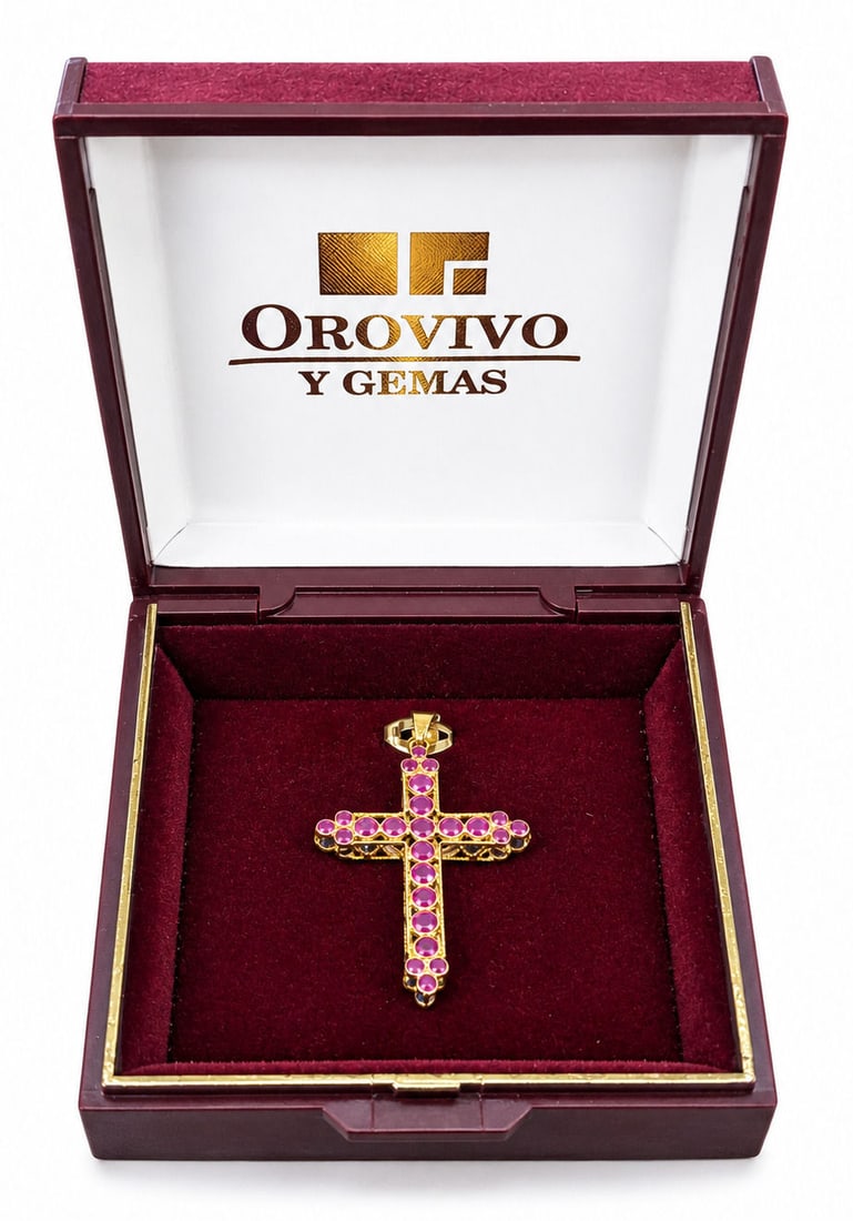 Orovivo Y Gemas 18K Yellow Gold Reversible Ruby & Blue Sapphire Cross Pendant: This finely crafted 18K yellow gold cross pendant by Orovivo Y Gemas features a fully reversible dual-sided design. One side is set with 19 natural round-cut rubies displaying a rich magenta-pink hue,