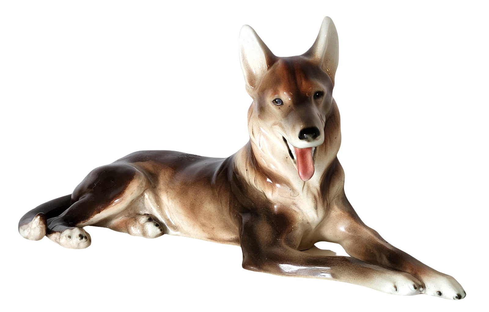 Goldscheider Vienna Porcelain German Shepherd Figure: Striking hand-painted porcelain figure of a reclining German Shepherd (Alsatian), modeled with alert ears and open mouth, tongue extended. The glaze features rich brown shading over a cream ground, ca