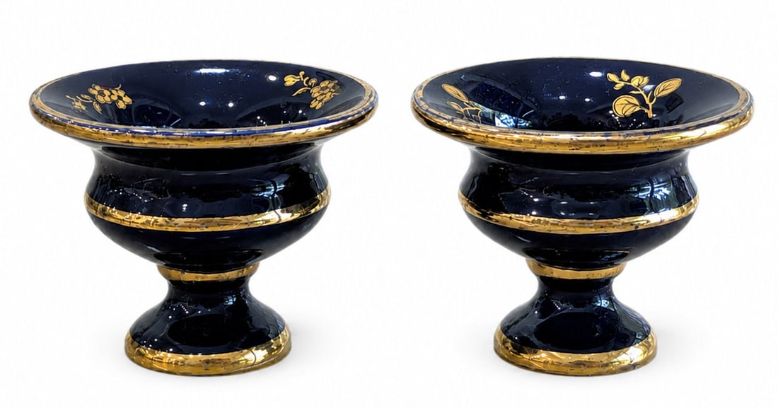 Pair of Small Vintage Genuine Cobalt Blue Glass Pedestal Salt Cellars or Open Salts: Charming pair of small vintage cobalt blue glass pedestal salts, each featuring a flared bowl raised on a pedestal foot. The interiors are decorated with delicate gilt floral and fruit motifs, while t