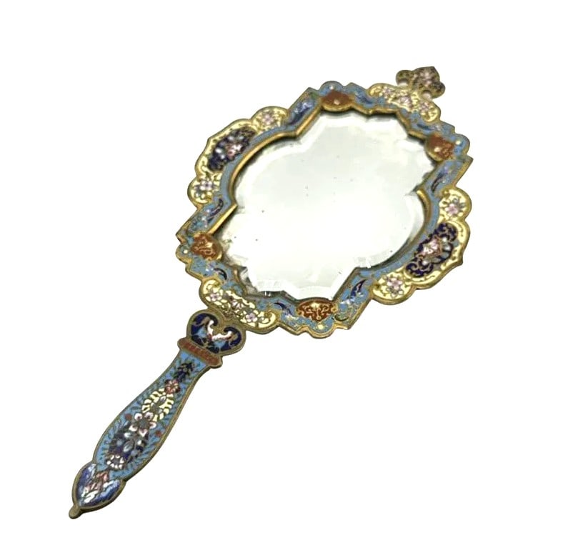 19th Century French Cloisonne Enamel and Gilt Handheld Crystal Mirror: 19th Century French Cloisonne Enamel and Gilt Handheld Crystal Mirror Measure 11 1/2"in H x 5 3/4"in W 19th century authentic exquisitely detailed handheld crystal mirror that is decorated with cloiso