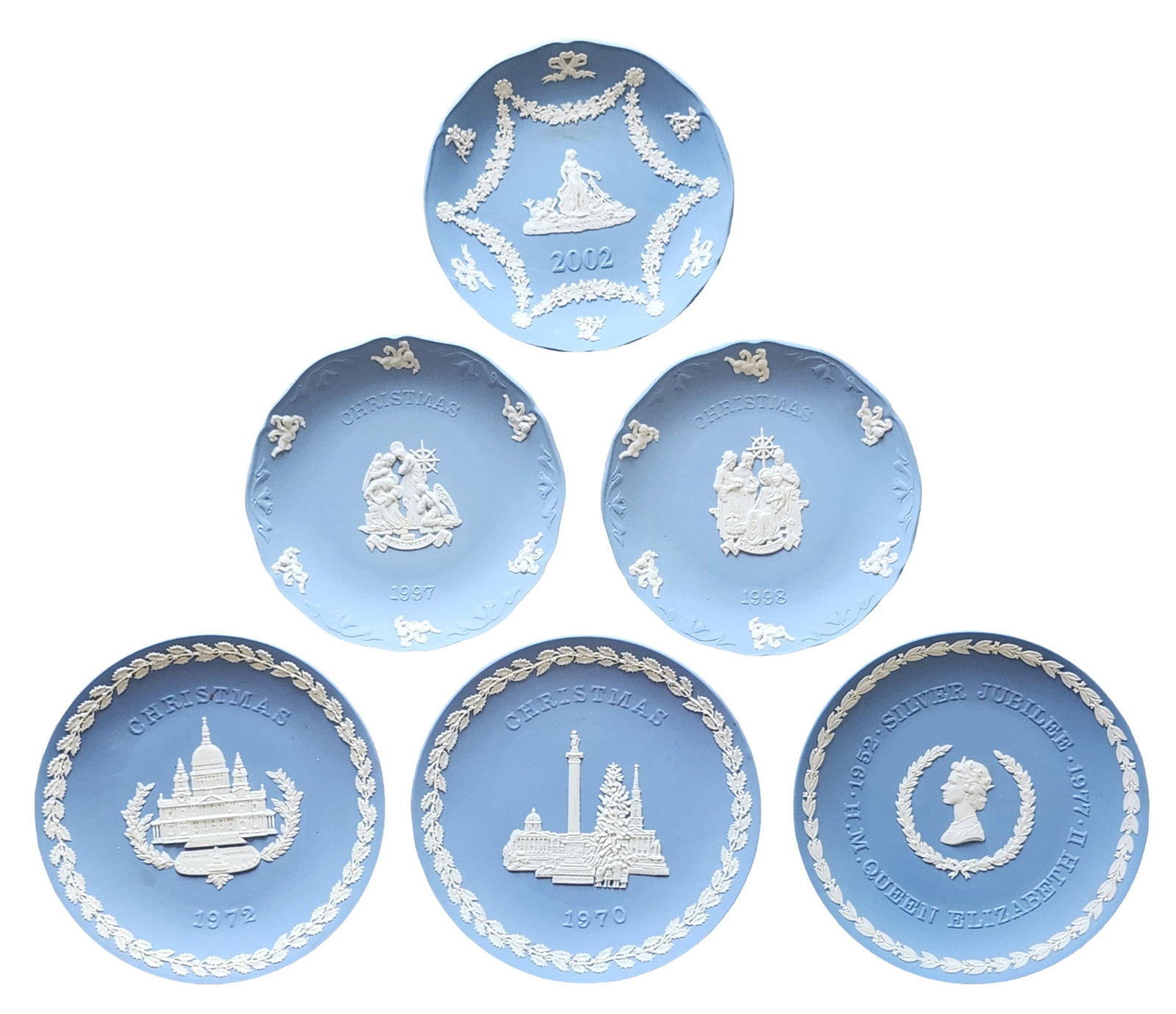 Group of 6 Wedgwood Jasperware Blue Collector Plates, Christmas & Commemorative: Collection of six Wedgwood jasperware collector plates in classic light and medium blue tones, each featuring applied white relief decoration in the neoclassical tradition. The group includes several 