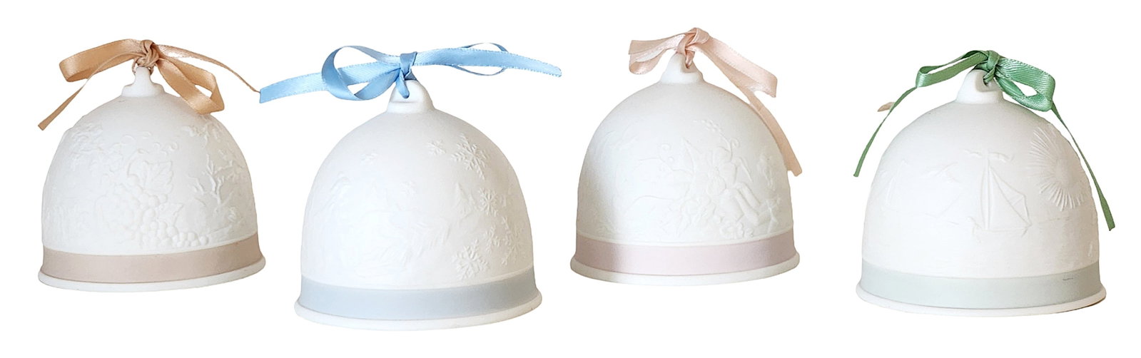 Four Lladro Porcelain Christmas Bell Ornaments, Collectors Society, 1990 - 1994: Group of four Lladro porcelain Christmas bell ornaments, each finely modeled in matte white bisque with raised relief decoration and fitted with colored satin ribbon hangers Examples include Collector