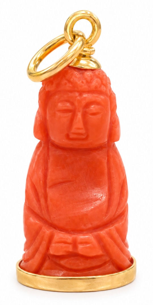 Vintage Yellow Gold & Carved Natural Red Coral Buddha Pendant: This vintage pendant features a finely hand-carved natural red coral figure of a seated Buddha in meditative posture with hands resting in Dhyana mudra. The carving highlights serene facial features, 
