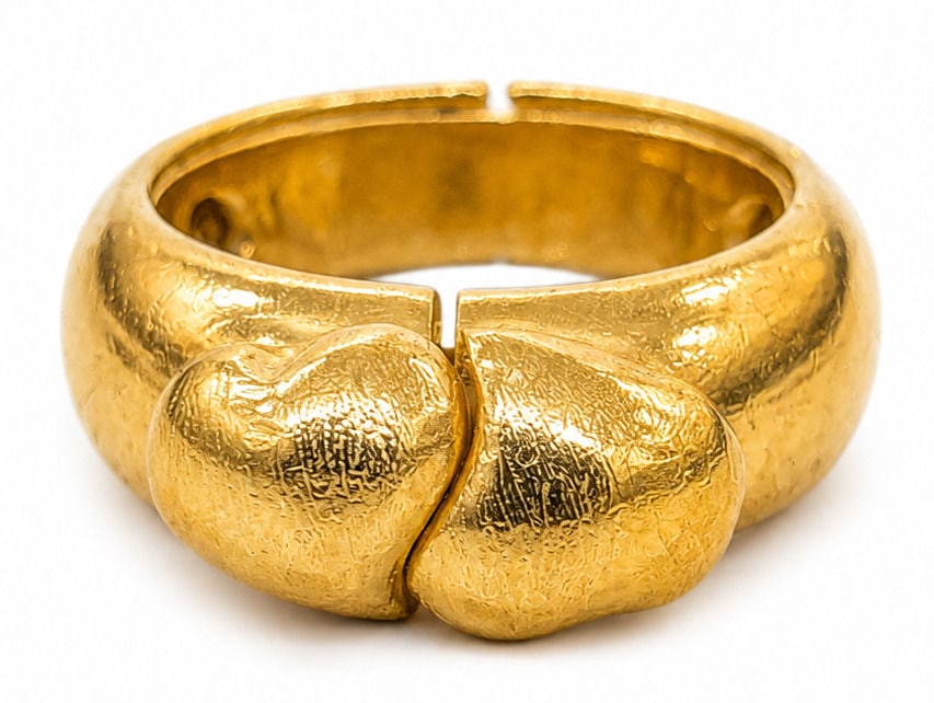 Italian 18K Yellow Gold Convertible Heart & "LOVE" Ring Set: This fine Italian-made 18K yellow gold ring features a versatile convertible construction consisting of an outer jacket ring and a removable inner band. The outer ring features two textured, heart-sha