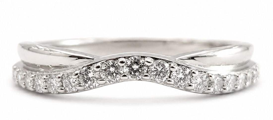 14K White Gold Curved Diamond Wedding Band: Metal: 14K White Gold Size 7 1/4 Weight 1.6g Total Diamond Weight: Approx. 0.25 CTW Diamond Shape: Round Brilliant Cut Setting: Prong Set Style: Curved/Contoured Diamond Band