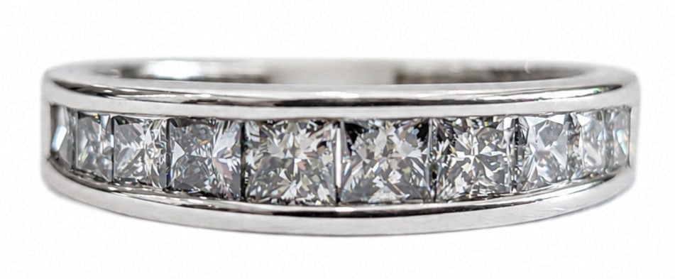 14K White Gold Princess Cut Diamond Channel-Set Band Ring 0.25 CTW: Metal: 14K White Gold Size 6 3/4 Weight: 4g Total Diamond Weight: Approx. 1.5 CTW Diamond Shape: Princess Cut Setting: Channel Set Style: Diamond Wedding/Anniversary Band