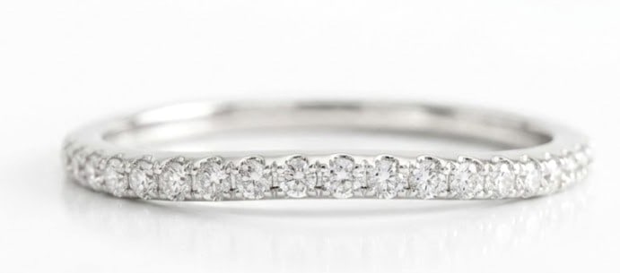 14K White Gold Diamond Eternity Style Band Ring: Metal: 14K White Gold Size 9 Weight 1.5g Total Diamond Weight: Approx. 0.25 CTW Diamond Shape: Round Brilliant Cut Setting Style: Prong Set Design: Curved / Contour Wedding Band