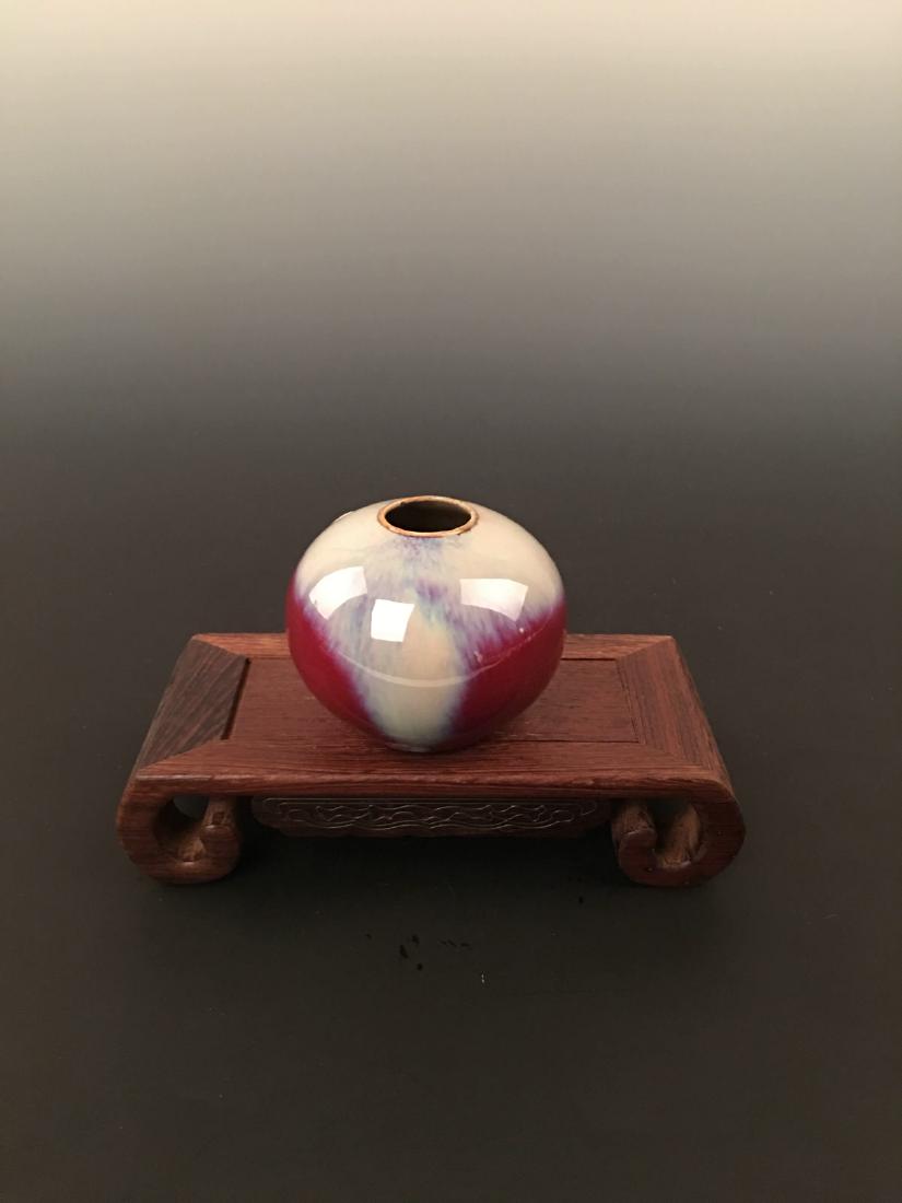 A Chinese Peach Bloom-Glazed Waterpot: A Chinese Peach Bloom-Glazed Waterpot 2-3/4" H X 3-1/2" W, 336g Shipping: We are able to pack and ship this item to an address in the United States for $25.00 via UPS Ground or USPS Priority Mail. Tra