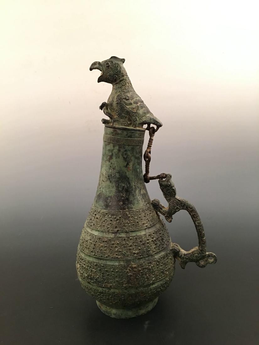 Chinese Bronze Wine Container: Chinese Bronze Wine Container 15" H x 8-1/2" W, 5.6 Lbs Shipping: We are able to pack and ship this item to an address in the United States for $40.00 via UPS Ground or USPS Priority Mail. Tracking in
