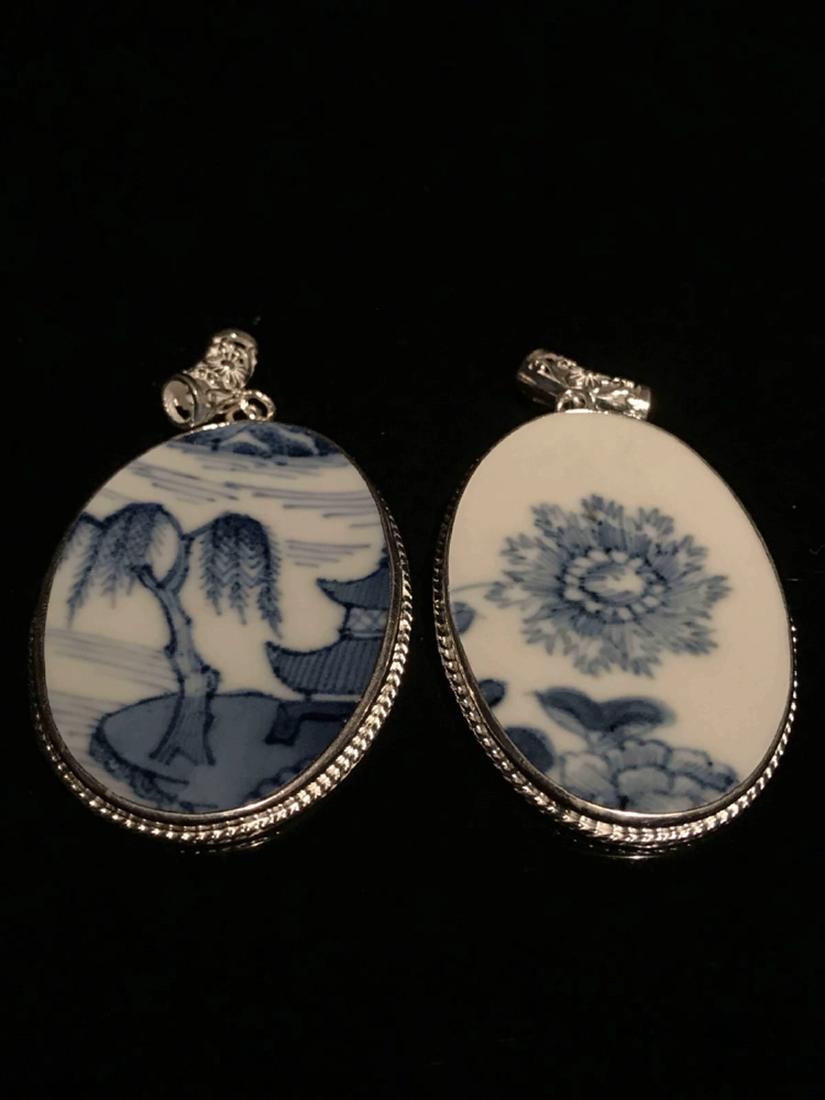 Two Pieces Blue and White Pendant: Two Pieces Blue and White Pendant 2.75" L x 1 3/8" W, 1.15 oz Shipping: We are able to pack and ship this item to an address in the United States for $20.00 via UPS Ground or USPS Priority Mail. Track