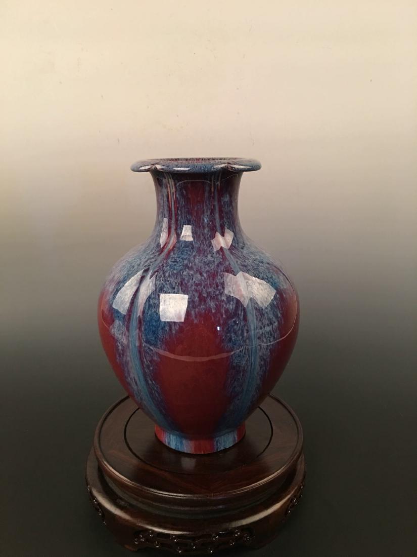 Flambe-Glazed Vase with Daoguang Mark: Flambe-Glazed Vase with Daoguang Mark 10-3/4" H X 7-1/2" W , 4.4 Lbs Shipping: We are able to pack and ship this item to an address in the United States for $35.00 via UPS Ground or USPS Priority Mail