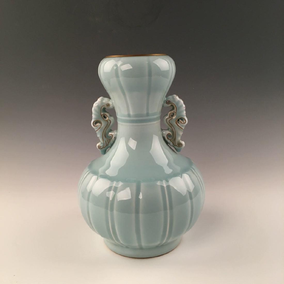 Chinese Blue Glazed Garlic Vase With Qianlong Mark: Chinese Blue Glazed Garlic Vase With Qianlong Mark 13'' H ; 8-1/2'' W, 7.6 lb Shipping: We are able to pack and ship this item to an address in the United States for $30.00 via UPS Ground or USPS Prio