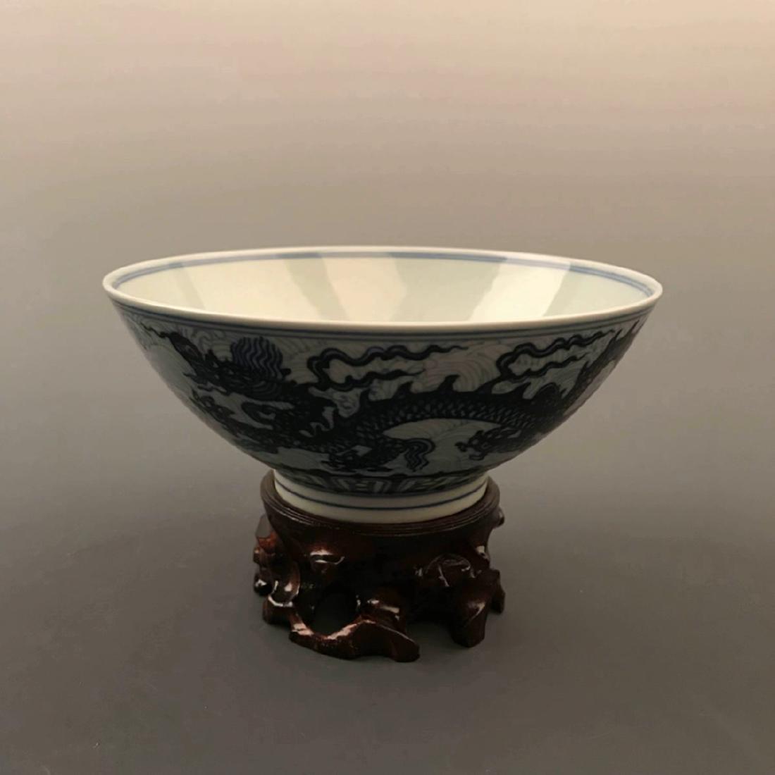 Chinese Blue and White Dragon Bowl with Xuande Mark: Chinese Blue and White Dragon Bowl with Xuande Mark 3" H X 7-1/4" W, 1 Lbs Shipping: We are able to pack and ship this item to an address in the United States for $30.00 via UPS Ground or USPS Priorit
