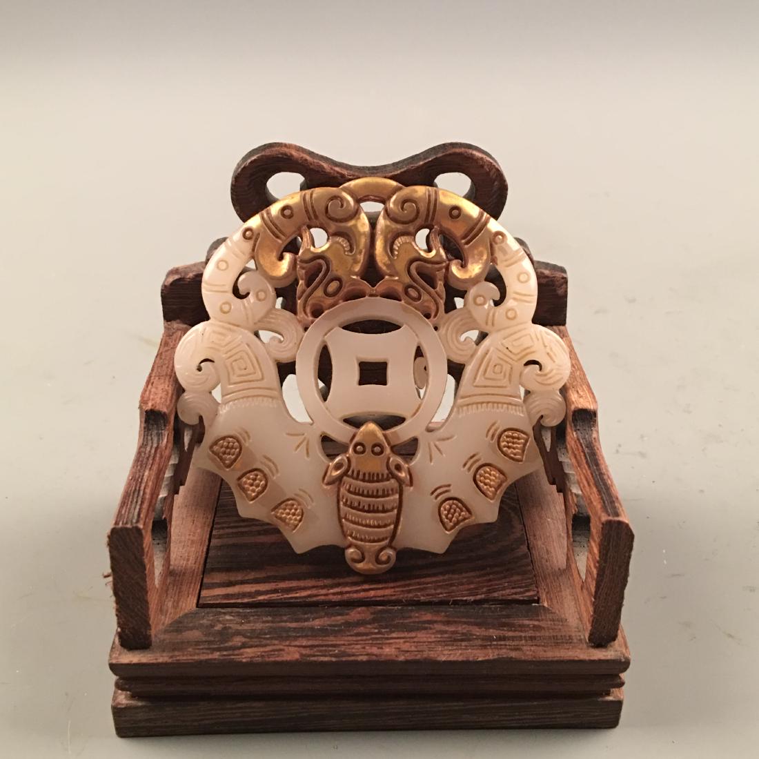 Chinese Archaic Gold Inlaid Jade Pendant: Chinese Archaic Gold Inlaid Jade Pendant 2-3/4'' H, 2-3/4'' W; 49 g Shipping: We are able to pack and ship this item to an address in the United States for $25.00 via UPS Ground or USPS Priority Mail.