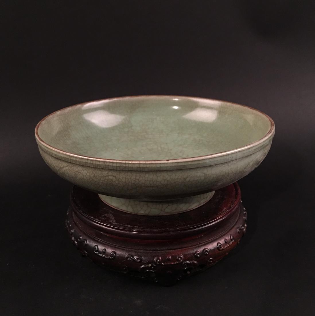 Chinese Longquan Kiln Bowl: Chinese Longquan Kiln Bowl 2-3/4'' H, 8'' W; 2 lb Shipping: We are able to pack and ship this item to an address in the United States for $35.00 via UPS Ground or USPS Priority Mail. Tracking informat