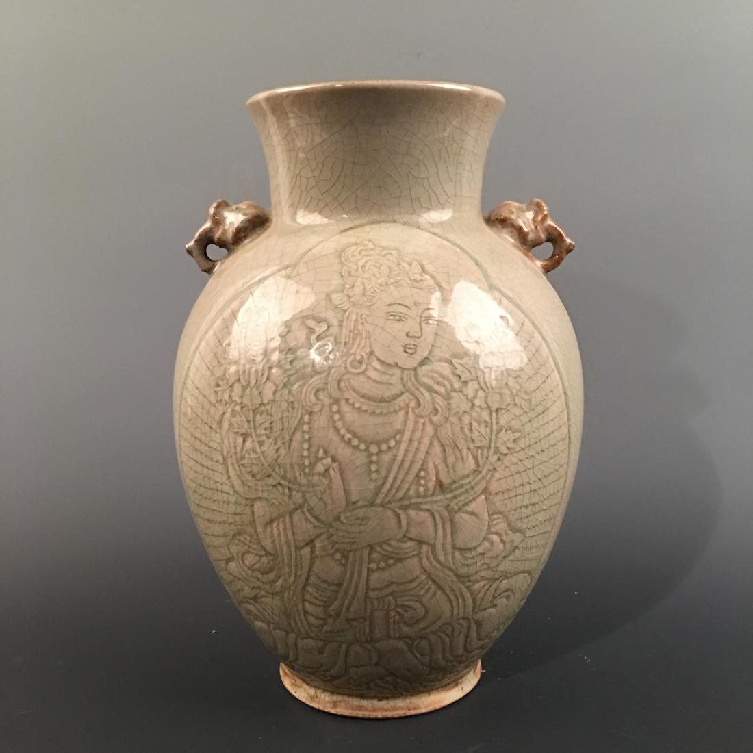 Chinese Yaozhou Kiln 'Guanyin' Vase: Chinese Yaozhou Kiln 'Guanyin' Vase 11'' H, 6-3/4'' W; 5.8 lb Shipping: We are able to pack and ship this item to an address in the United States for $35.00 via UPS Ground or USPS Priority Mail. Track