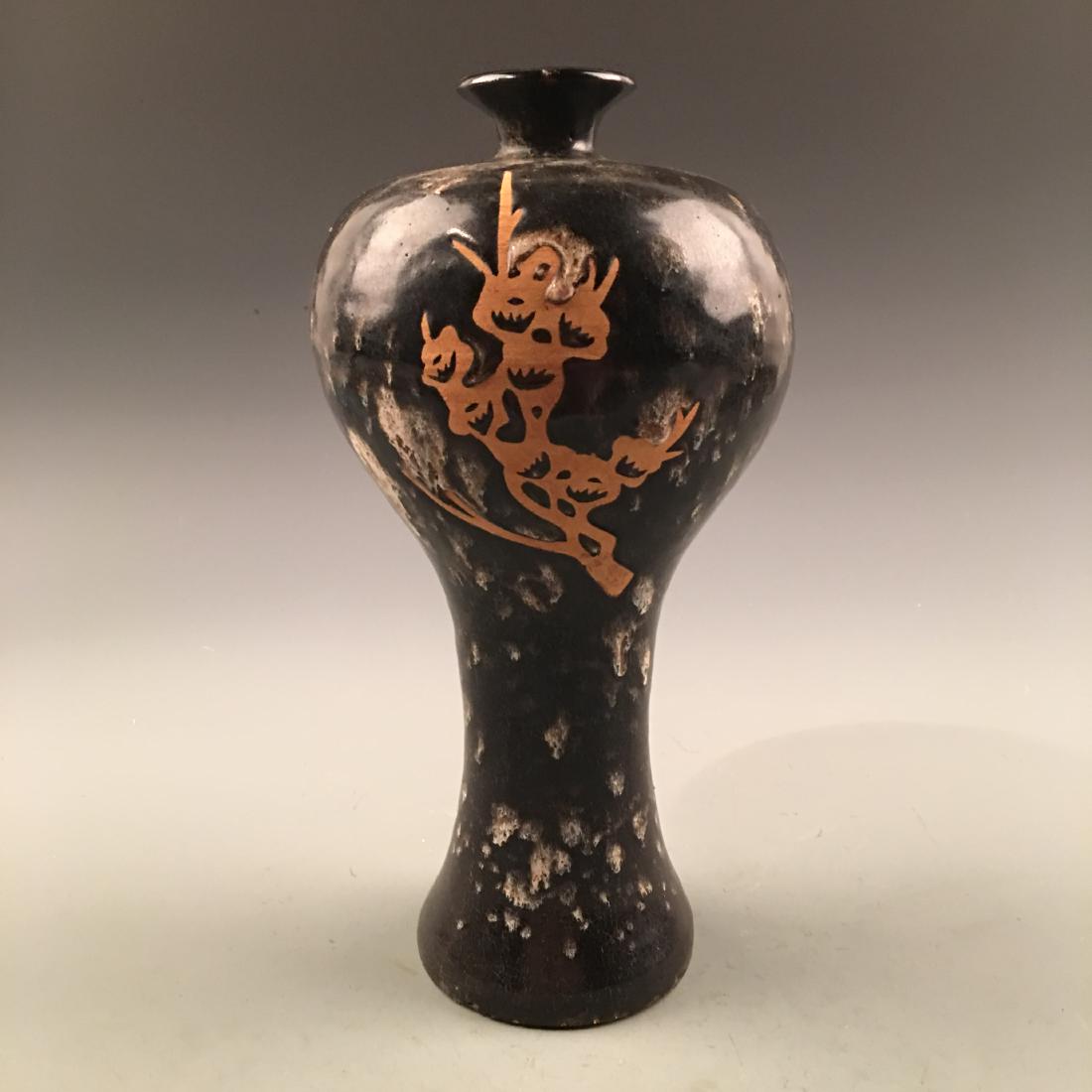 Chinese Cizhou Kiln 'Flower' Vase: Chinese Cizhou Kiln 'Flower' Vase 12'' H, 6-7/8'' W; 2.21 lb Shipping: We are able to pack and ship this item to an address in the United States for $35.00 via UPS Ground or USPS Priority Mail. Tracki