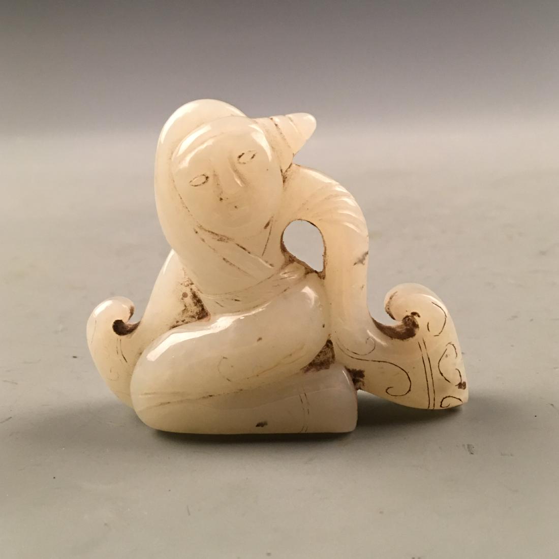 Chinese Archaic Carved Jade Dancer: Chinese Archaic Carved Jade Dancer 2-1/4'' H, 2-5/8'' W; 78 g Shipping: We are able to pack and ship this item to an address in the United States for $20.00 via UPS Ground or USPS Priority Mail. Track