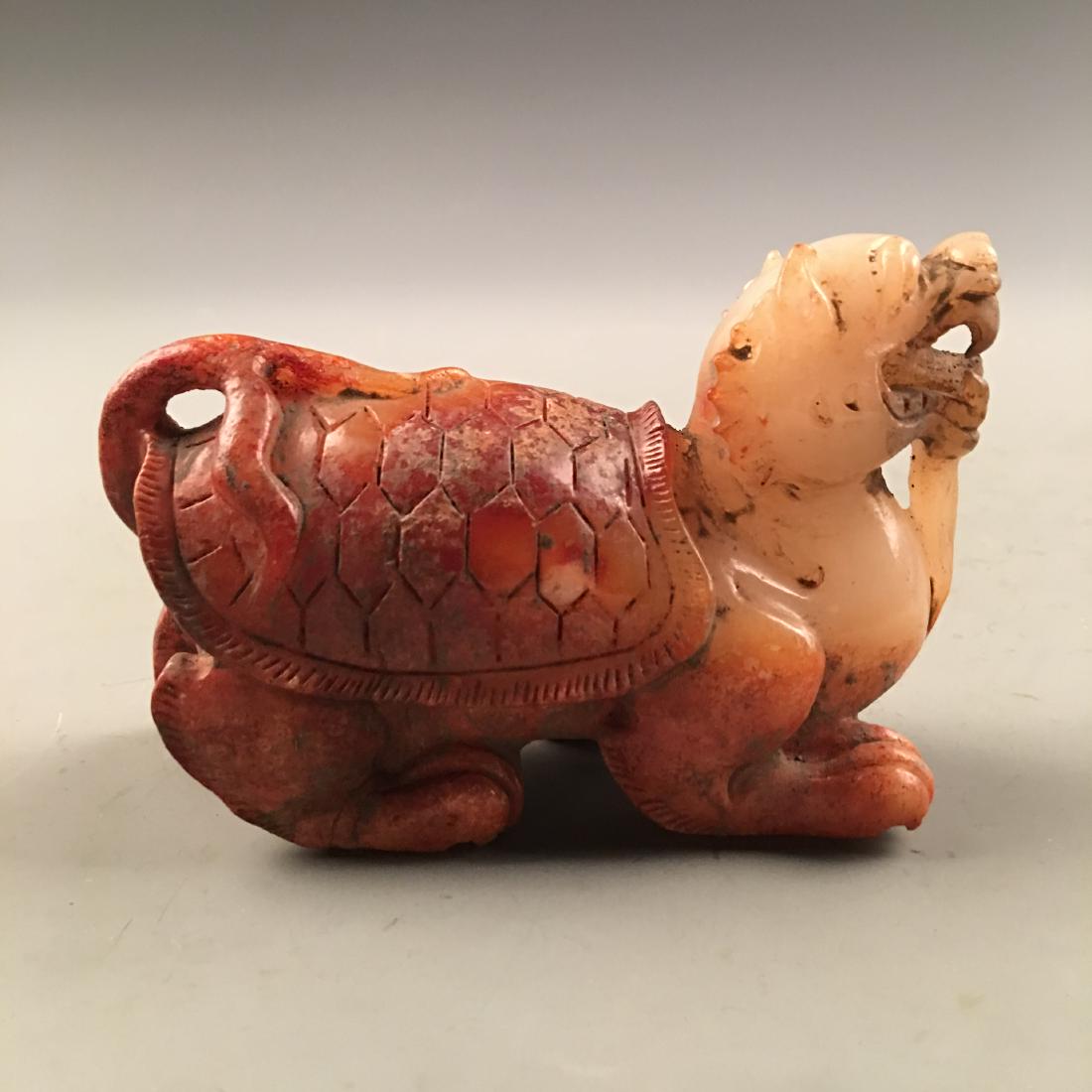 Chinese Archaic Jade 'Rui Shou': Chinese Archaic Jade 'Rui Shou' 2-5/8'' H, 1-3/4'' W, 4-1/2'' L; 441 g Shipping: We are able to pack and ship this item to an address in the United States for $25.00 via UPS Ground or USPS Priority Ma