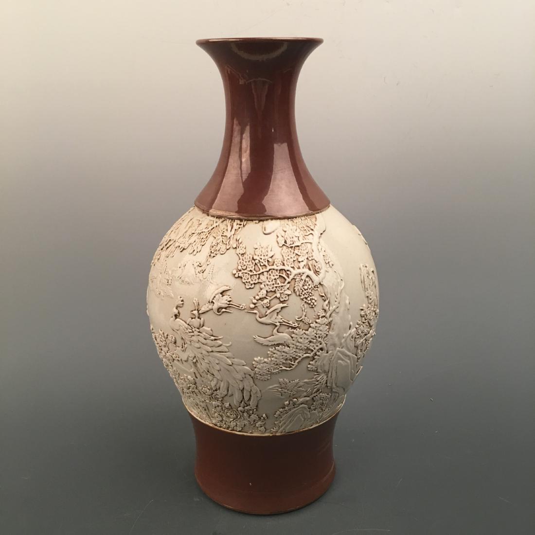 Chinese Engraved Vase: Chinese Engraved Vase 15-1/4''H, 7''W; 6 lb Shipping: We are able to pack and ship this item to an address in the United States for $40.00 via UPS Ground or USPS Priority Mail. Tracking information wi